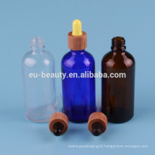 Wooding dropper cap for essential oil bottle